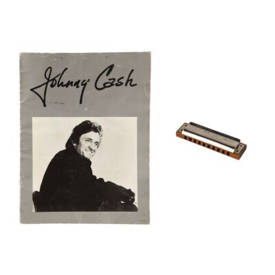 Lot # 524. Johnny Cash Stage-Used Harmonica with Magazine ### JOHNNY CASH