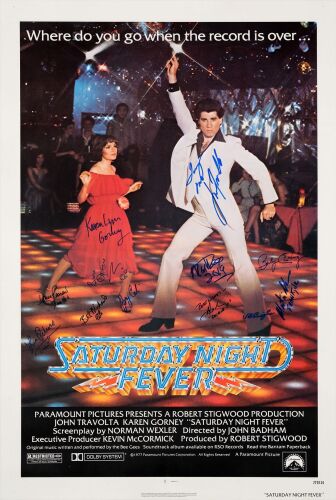 234. One Sheet (27.5" x 41") Signed by John Travolta, Karen Lynn Gorney, Donna Pescow, Bruce Ornstein, Monti Rock, Robert Costanzo, Lisa Peluso, Bert Michaels, Joseph Cali, Paul Pape and Val Bisoglio ### SATURDAY NIGHT FEVER (1977)
