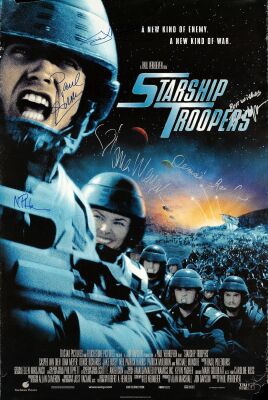 876. One Sheet (26.5" x 39.5") Signed by Paul Verhoeven, Denise Richards, Dina Meyer, Neil Patrick Harris, Jake Busey & Patrick Muldoon (JSA COA); Double-Sided; Fine Rolled ### STARSHIP TROOPERS (1997)