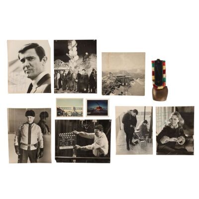 Lot # 122. Crew Gift Cowbell with George Lazenby and Diana Rigg-Autographed Photographs and Behind-the-Scenes Materials ### JAMES BOND: ON HER MAJESTY'S SECRET SERVICE (1969)