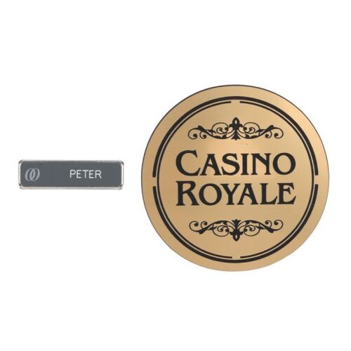 Lot # 342. Casino Royale Chair Plaque and Ocean Club Name Badge ### JAMES BOND: CASINO ROYALE (2006)