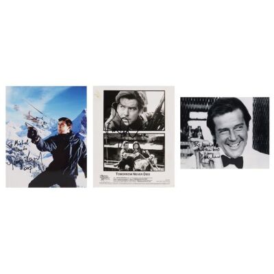 Lot # 399. Trio of Photographs Autographed by Roger Moore, Pierce Brosnan, and George Lazenby ### JAMES BOND FRANCHISE (1962-PRESENT)