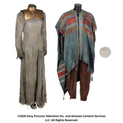 Lot # 231. Egwene al'Vere's Damane Flashback Costume and Rand al'Thor's Flashback Costume with Sakarnen ### WHEEL OF TIME, THE (T.V. SERIES, 2021-2023)